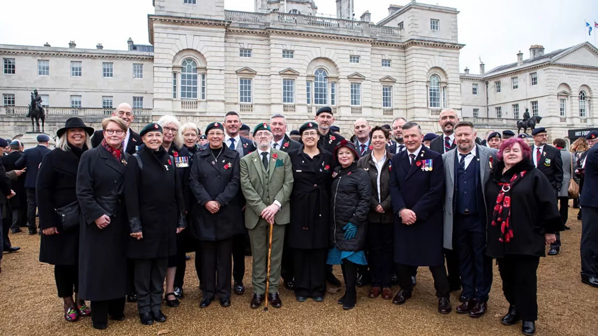 Group picture of LGBTQ veterans on the day of the first ever LGBTQ Veterans march in Cenotaph in 2021,