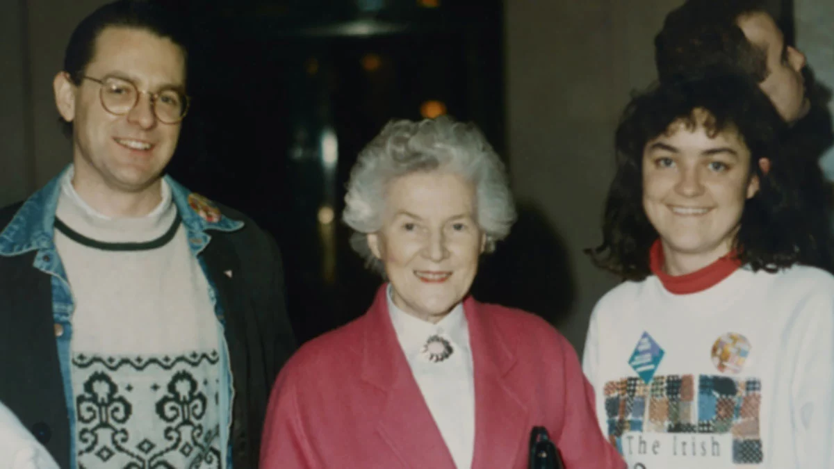 Photo by George A. Healy. Pictured is Cathal Kerrigan who tells his story of family with a photograph taken at the ‘Irish Quilt Tour: An AIDS Memorial’ in 1991. The photograph shows Cathal, his mother, Margaret, and Áine Casey, in Cork City Hall, at the event. 