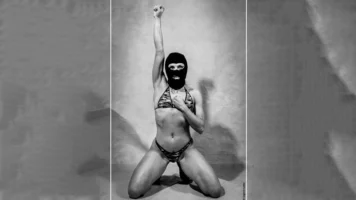 Isis Rodríguez, Zapatista Stripper, developed during Guillermo Gomez-Peña’s The Mexterminator Project (1998). Photo by Eugenio Castro.